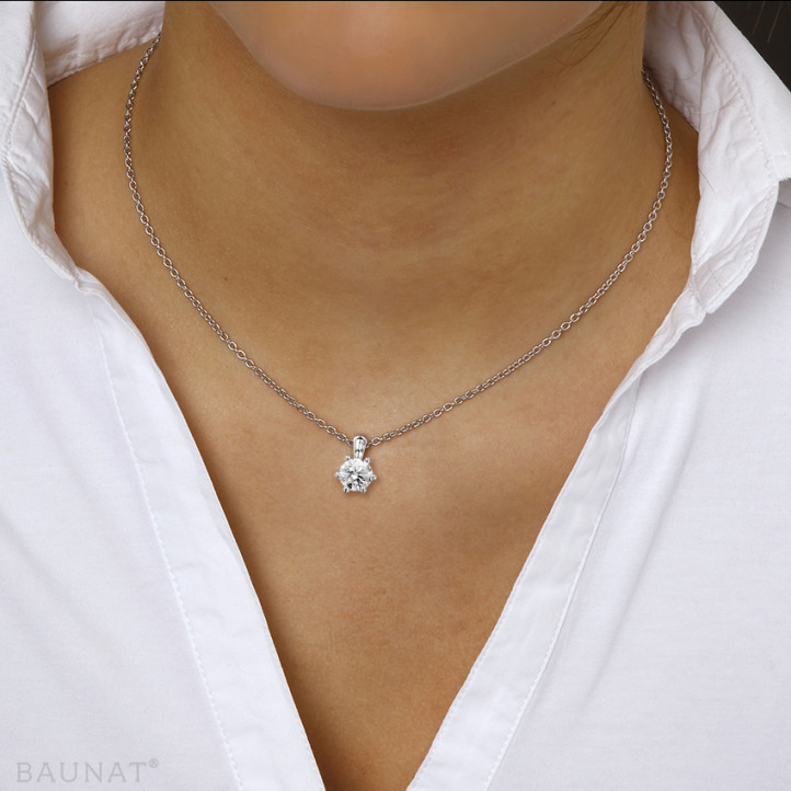 1.25 carat white golden solitaire pendant with round ...